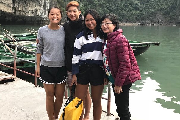 Christine Deng with her family in Vietnam.