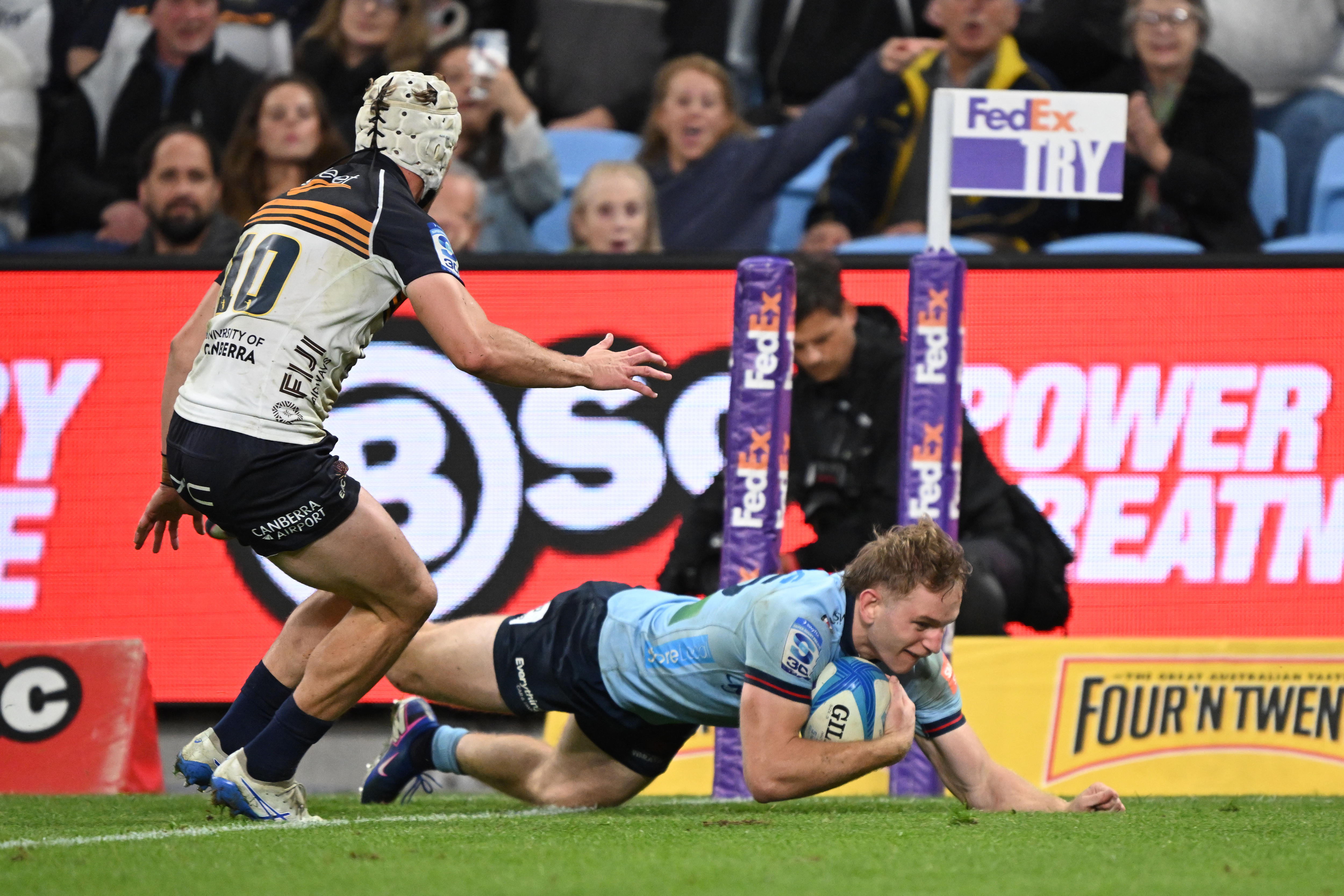 Max Jorgensen scores a try for the Waratahs.