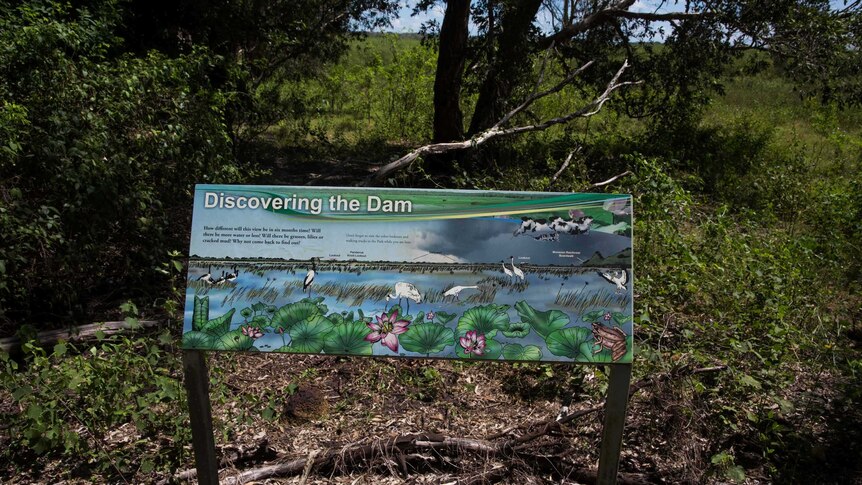 A photo of a sign showing wildlife at Fogg Dam during times of higher water levels.