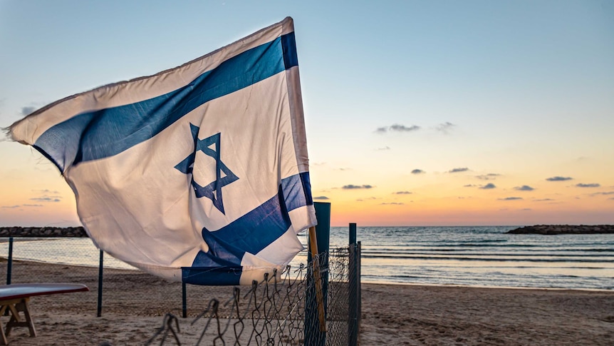 Israel flag near beach