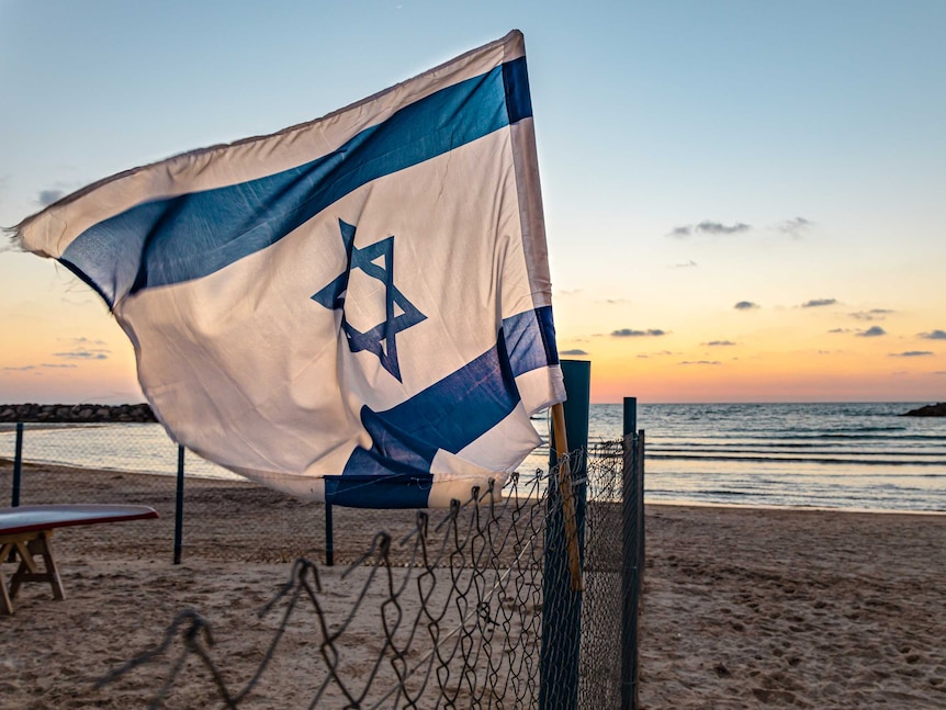 Israel flag near beach