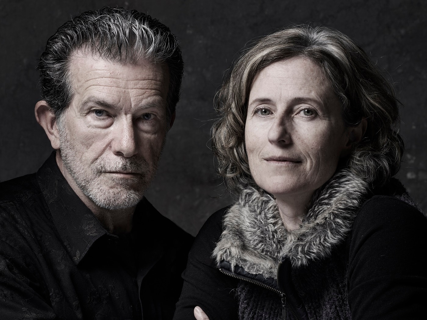 A desaturated portrait of Richard Morecroft and Alison Mackay.