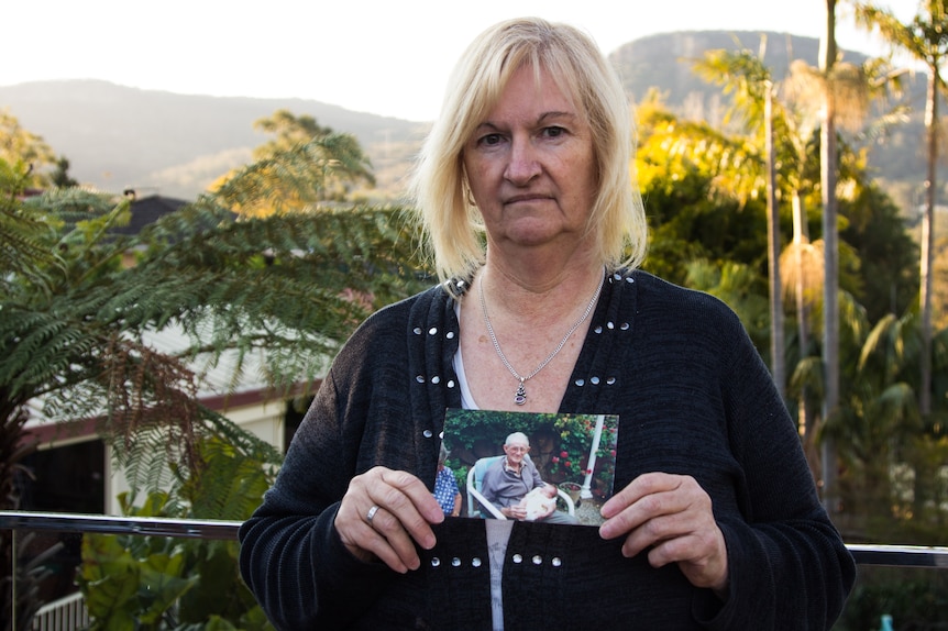 Sandra Jones with a photo of her grandfather Robert