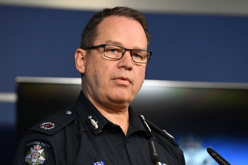 Victoria Police Assistant Commissioner Ross Guenther addresses the media at a press conference.