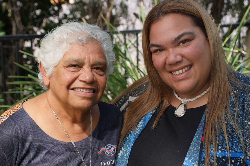 Darumbal elder Nicky Hatfield and her granddaughter Lelarnie smile at the camera