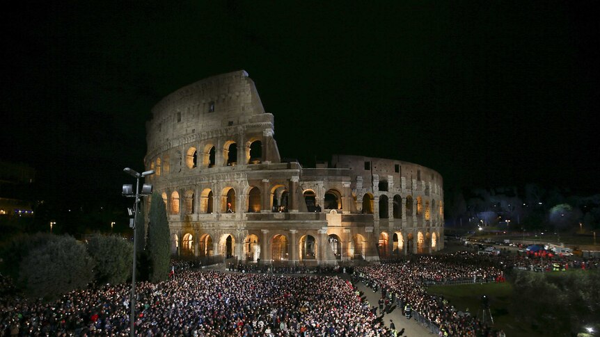 Large crowds gather outside the Colosseum