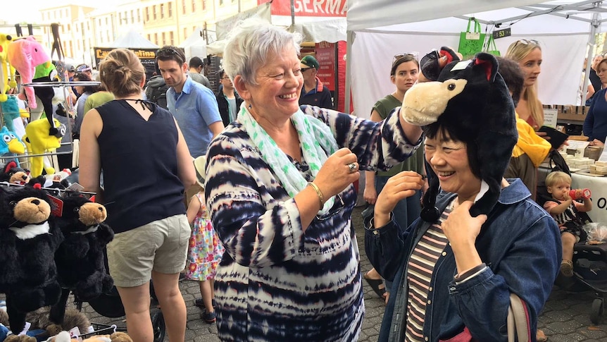 Jillian Hall and her Japanese pen pal of 55 years, Kumiko Maruyama, at Hobart's Salamanca market.