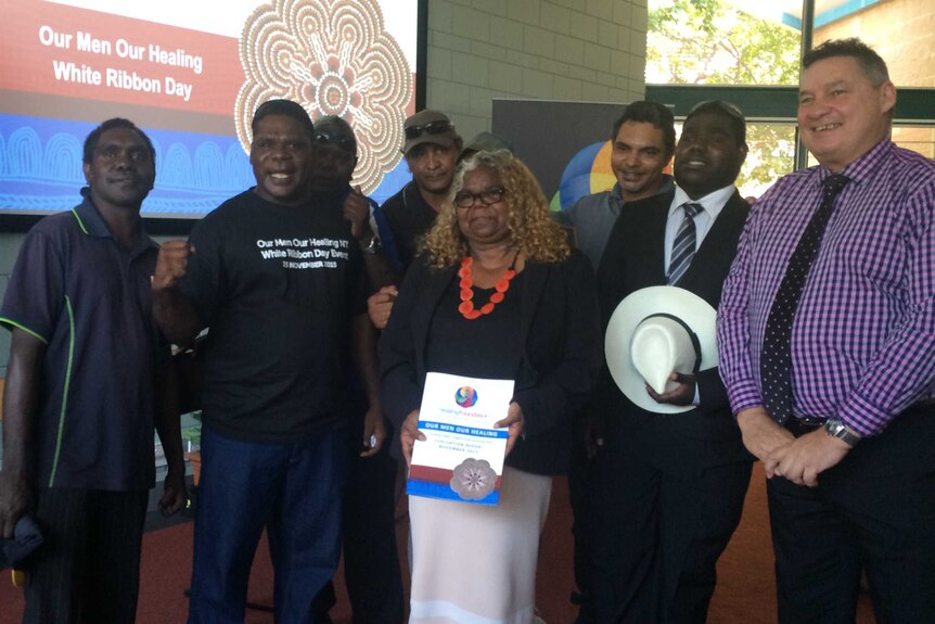 Bess Price stands with a group of men at a White Ribbon event.