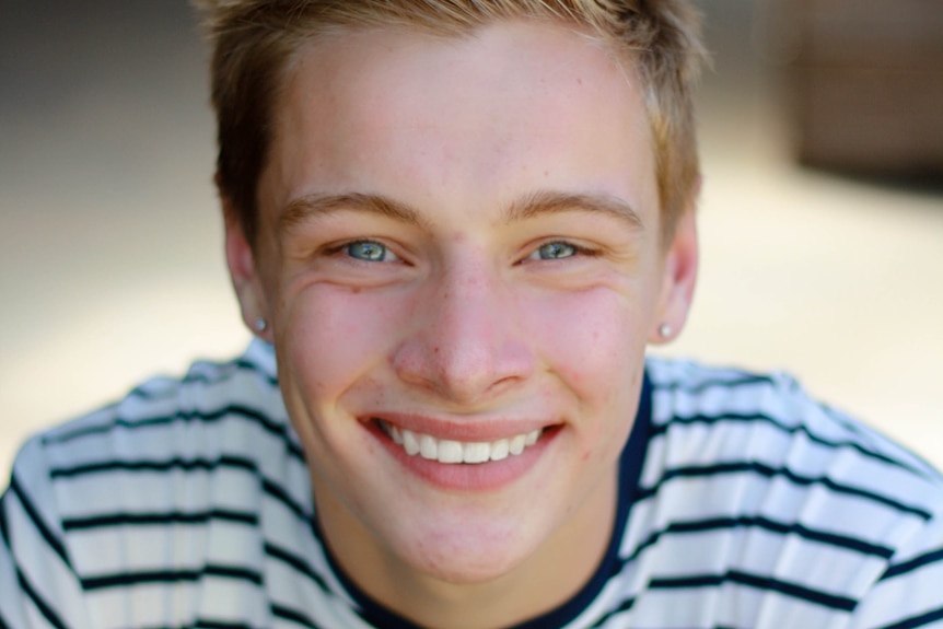 A headshot of a young man.