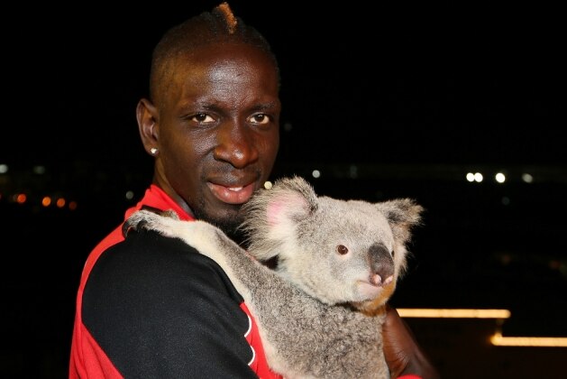 Mamadou Sakho holding a koala