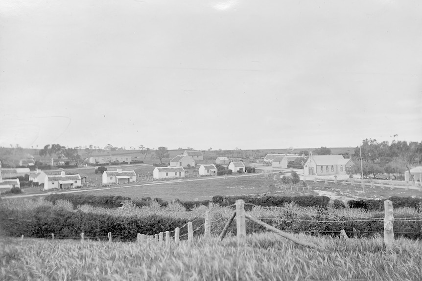 Point McLeay Mission Station in 1905, showing the country side and several stone buildings.
