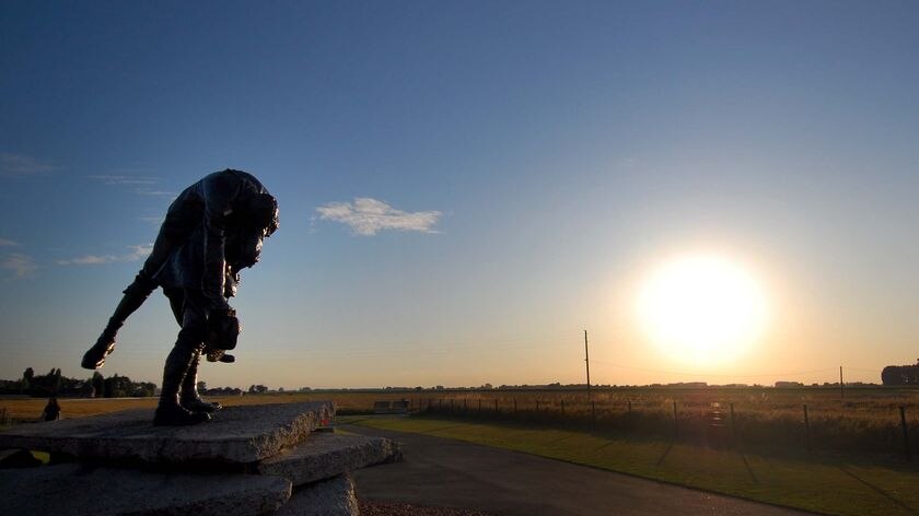 A statue titled 'Cobbers' stands at the WWI memorial at Fromelles in northern France