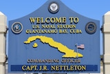 Sign at the entrance to the Guantanamo Bay prison, Cuba.