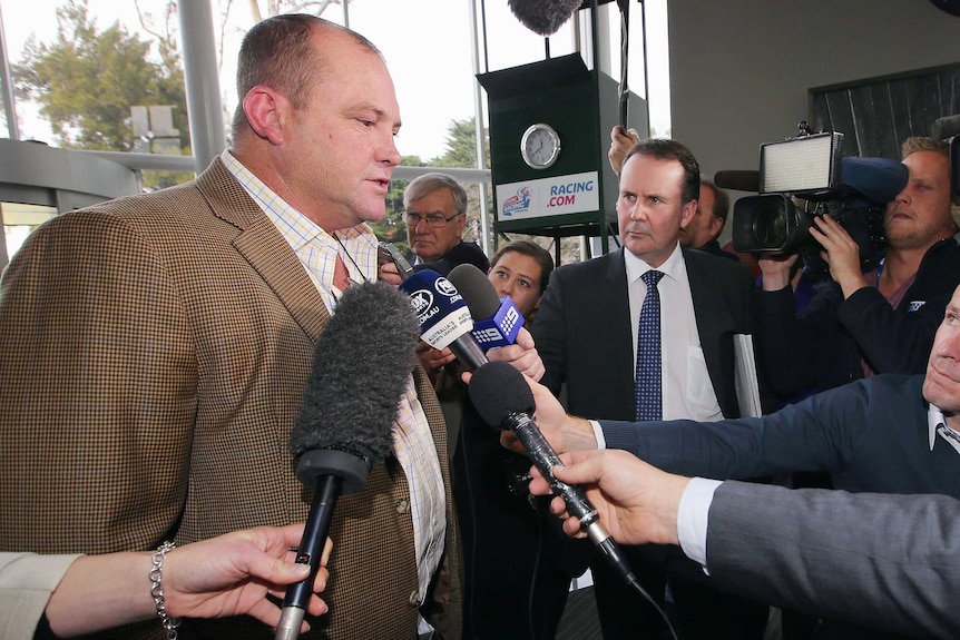 Trainer Peter Moody speaks to the media after facing stewards hearing in July.