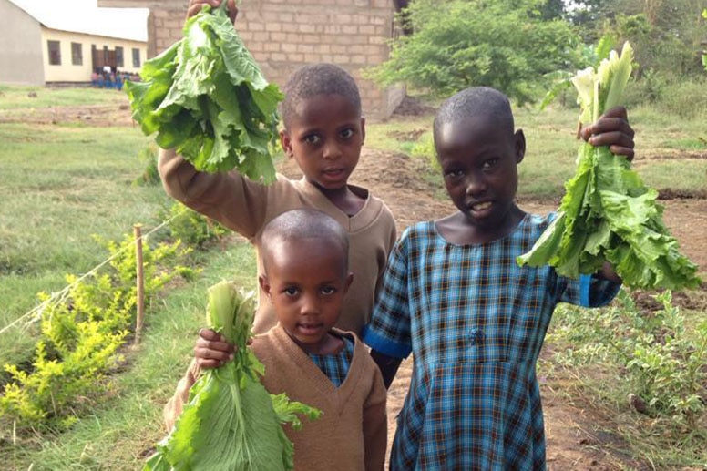 Bandari school children show off their produce
