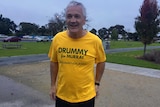 Nationals candidate for Murray, Damian Drum, wears a yellow Drummy for Murray t-shirt.