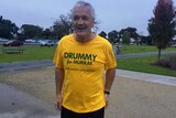Nationals candidate for Murray, Damian Drum, wears a yellow Drummy for Murray t-shirt.