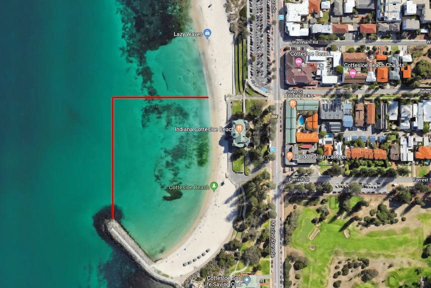 A Google Maps aerial shot of Cottesloe Beach showing a red line representing a shark net.