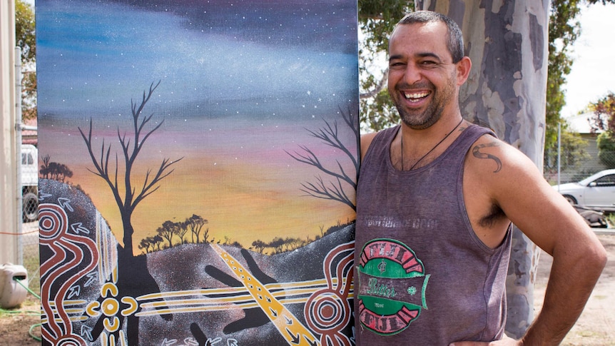Local artist Alfie Hudson with one of his artworks to be showcased in the Gippsland Lakes art show