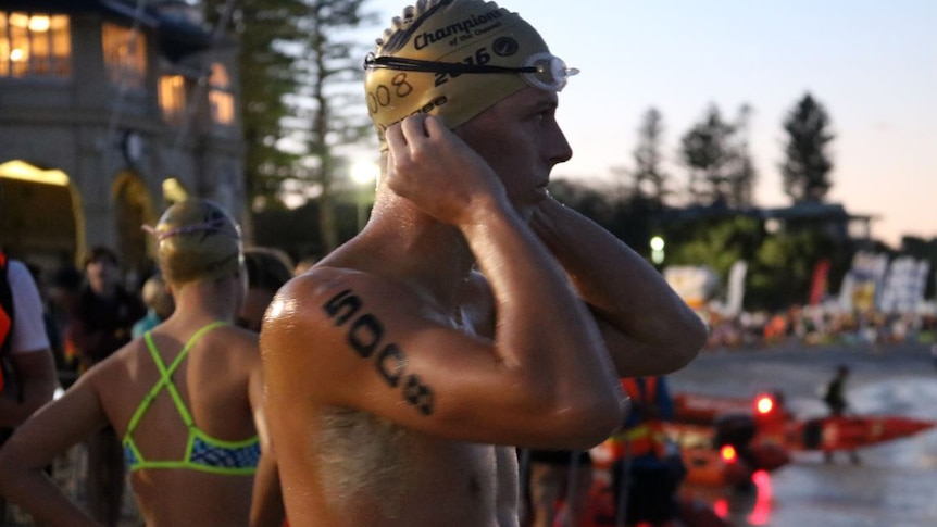Close up of swimmer Cameron Schminters at Cottesloe beach.