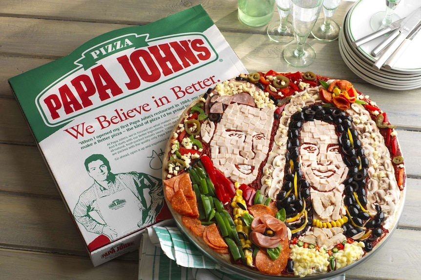 Pizza decorated with Kate and Will's faces