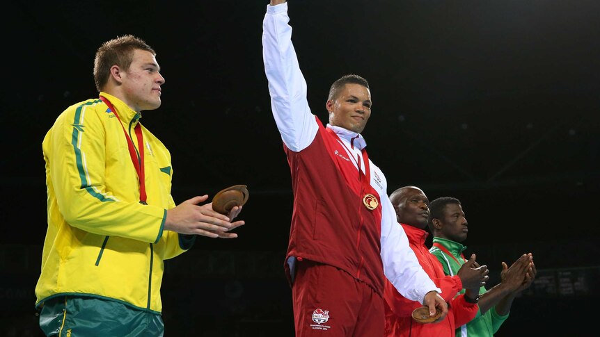 Joseph Joyce celebrates gold medal as Joseph Goodall looks on