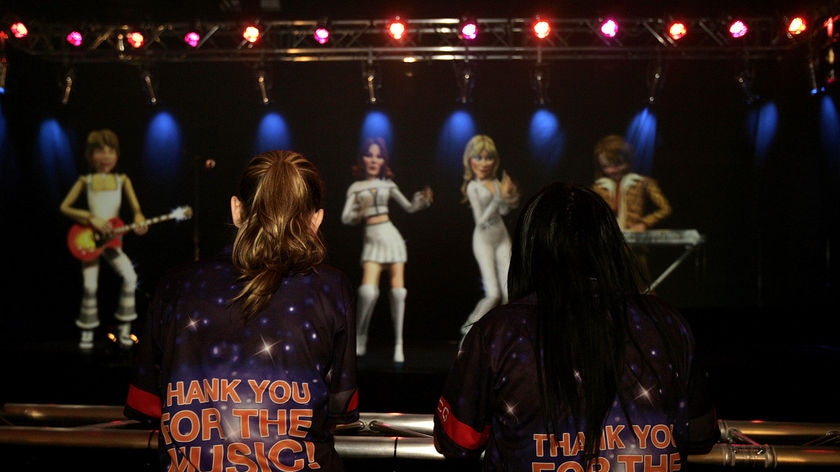 Workers prepare the Abba World Interactive Exhibition in Melbourne on June 17, 2010.