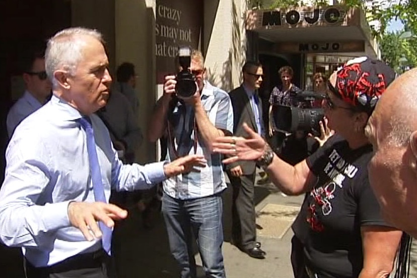 Malcolm Turnbull is confronted by a protester