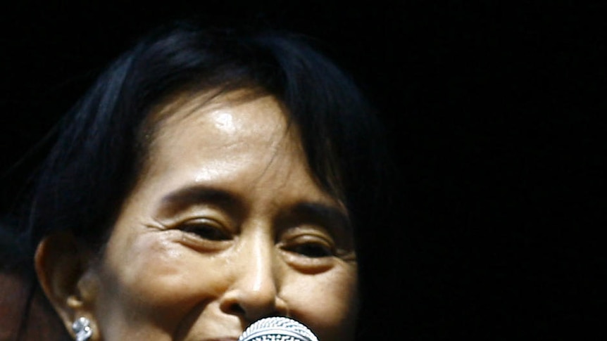 Aung San Suu Kyi speaks to supporters a day after her release from house arrest