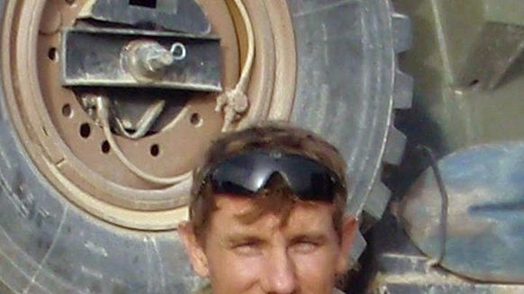 Photo of a smiling SAS Trooper Jason Thomas Brown