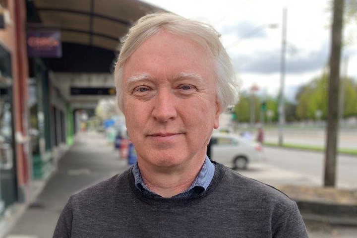 Glen McCallum standing on the street.