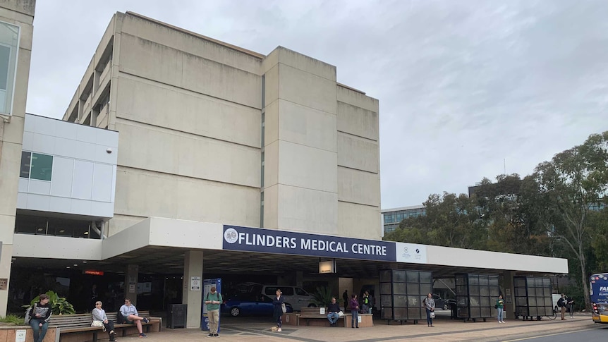 The front of a hospital building with a sign reading Flinders Medical Centre