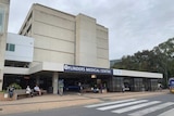 The front of a hospital building with a sign reading Flinders Medical Centre