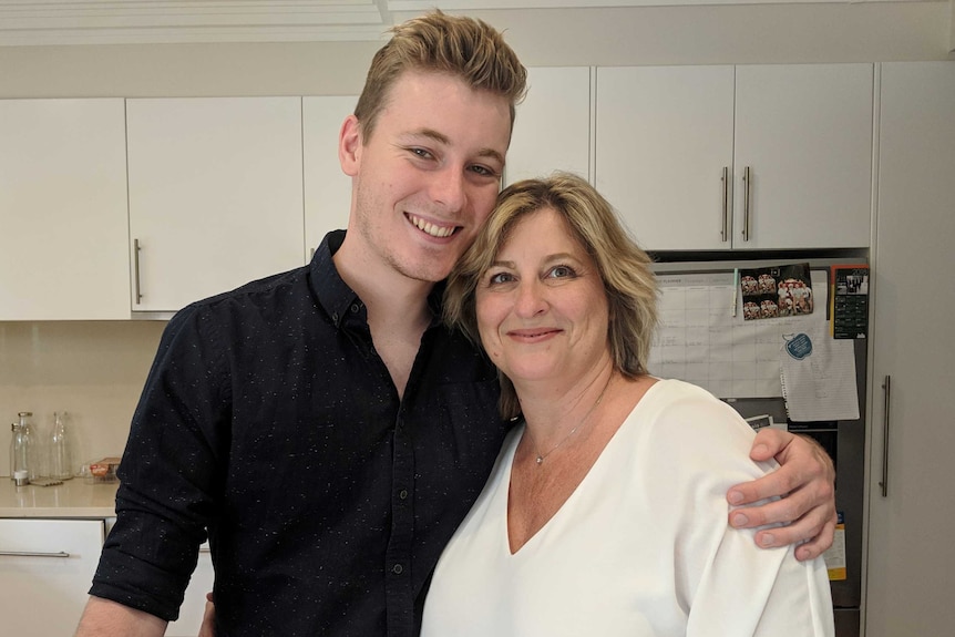 Finn Stannard has his arm around his mother Meaghan Stannard