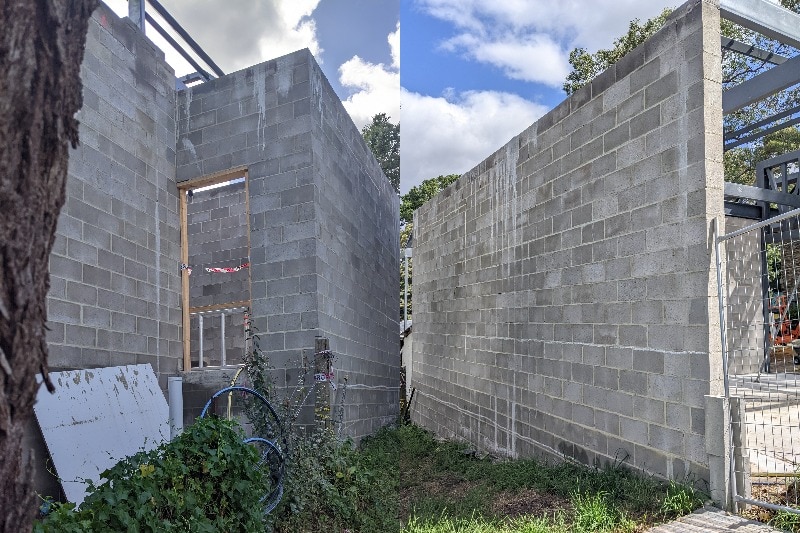 A concrete wall on a suburban block