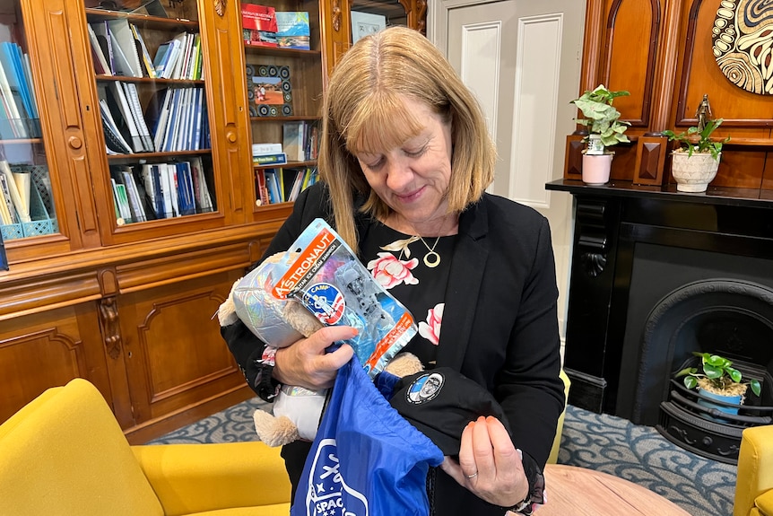 Loreto college ballarat principal michelle brodrick with packages from NASA