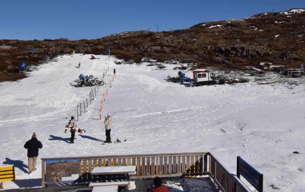 Patchy snow cover at a ski field.