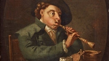 A portrait of a man seated at a table, wearing a green coat and hat, playing the baroque oboe.
