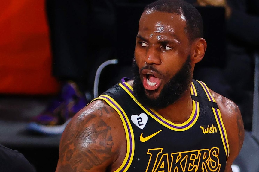 LeBron James looks to the right and opens his mouth