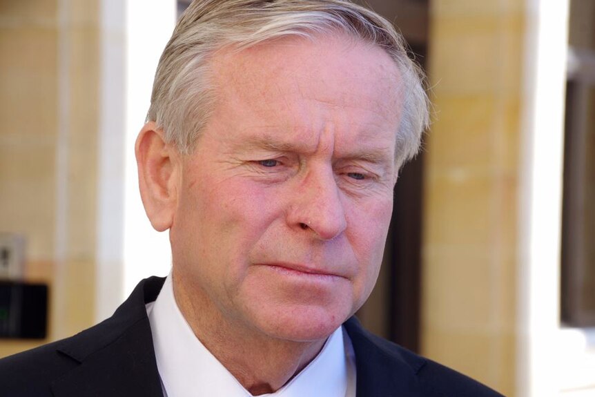 Close-up of WA Premier Colin Barnett looking worried