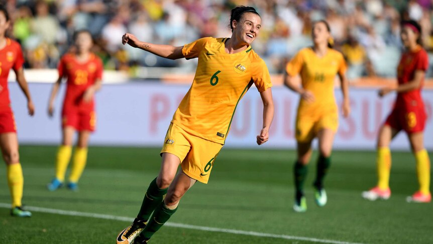 Chloe Logarzo celebrates a goal for the Matildas against China.