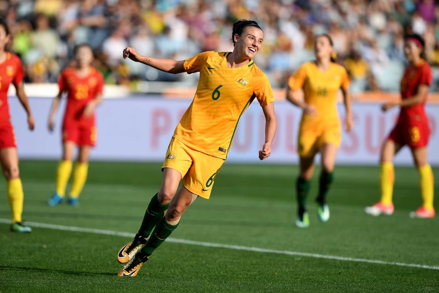 Chloe Logarzo celebrates a goal for the Matildas against China.