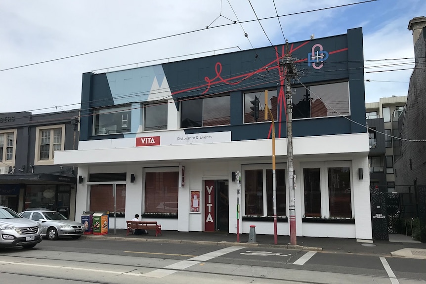 The exterior of a building with a sign saying 'VITA Ristorante & Events'.