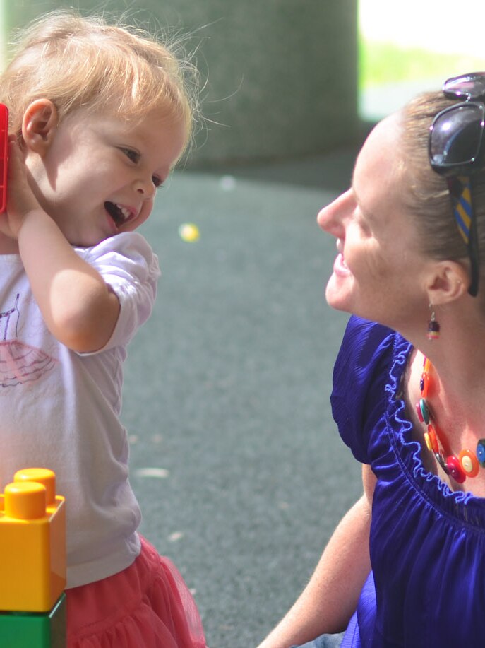 Rebecca Dixon plays with her daughter Christi at the Browns Plains Early Years Centre.