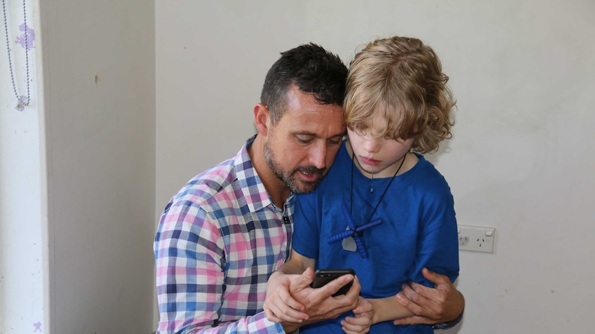 Stuart Latham and his son Henry