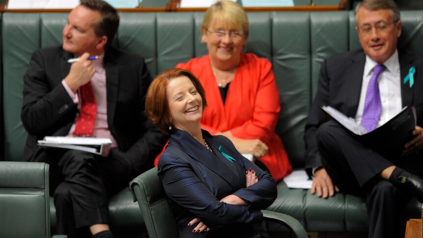 Prime Minister Julia Gillard laughs during House of Representatives question time