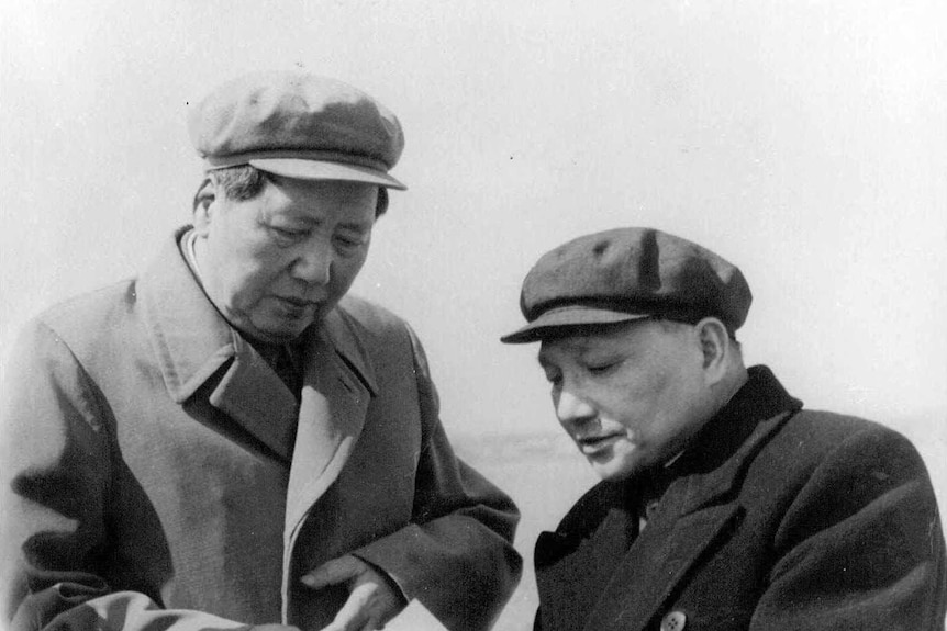 Black and white photo of Chairman Mao Zedong and Deng Xiaoping from 1959.