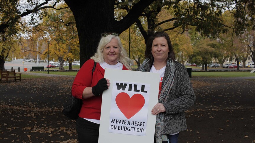 Child protection officer Mandy Taylor and fellow protester