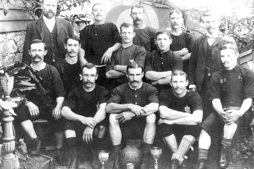 A black and white photo of the Balgownie Rangers Football Club players posing for a team photo.