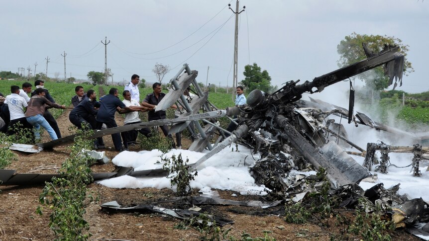 Charred remains of Indian helicopters after crash